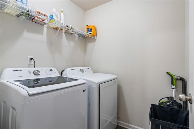 washroom with washer and clothes dryer