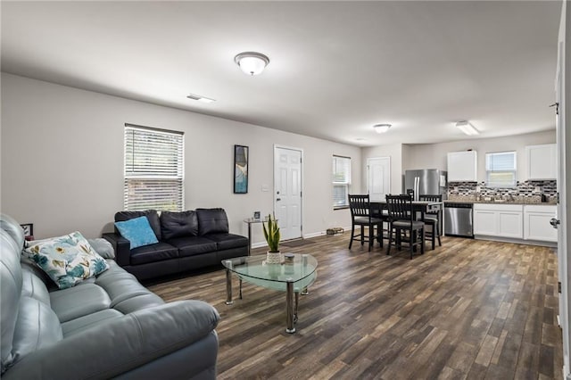 living room featuring dark hardwood / wood-style floors