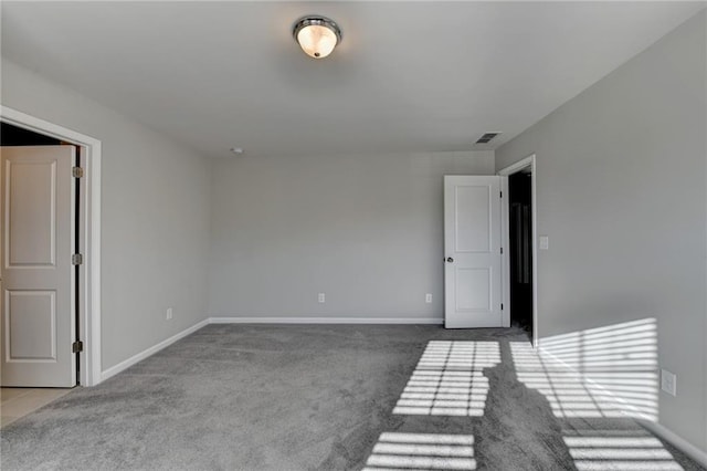 unfurnished room featuring carpet floors