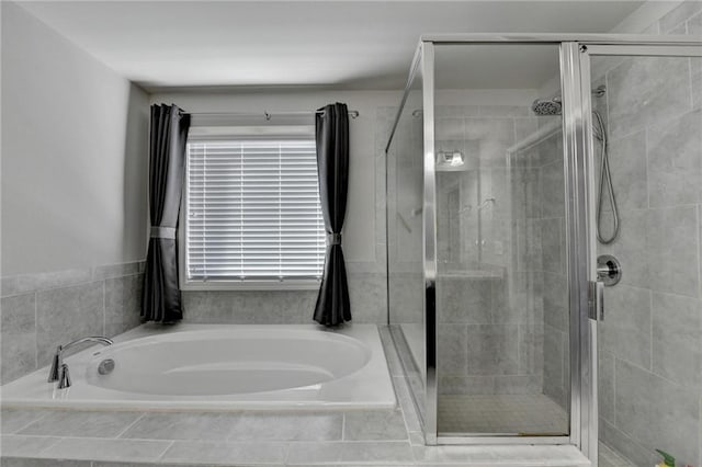 bathroom with independent shower and bath