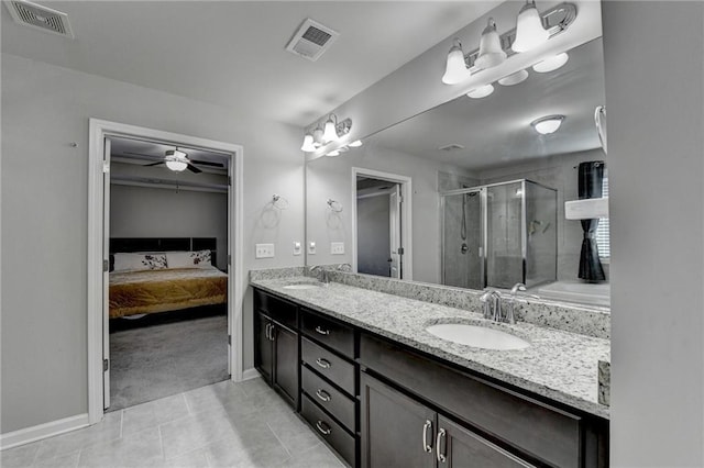 bathroom featuring vanity, tile patterned floors, an enclosed shower, and ceiling fan