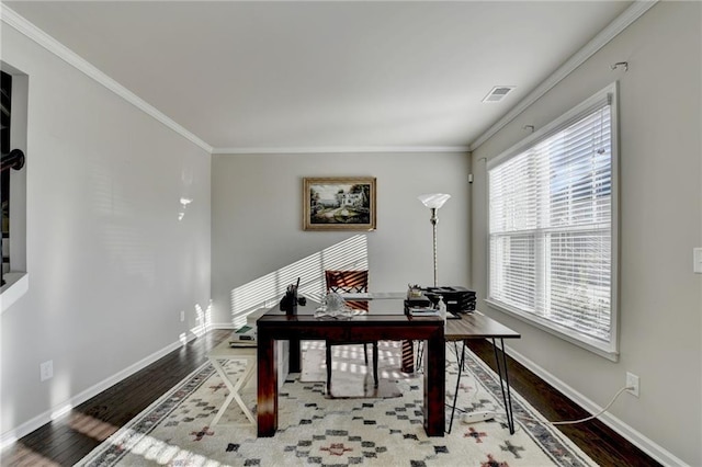 office with wood-type flooring and ornamental molding