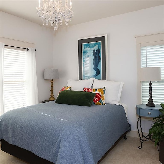 730 Midway Ave, Canton, GA 30114 - bedroom with carpet, multiple windows, and a chandelier
