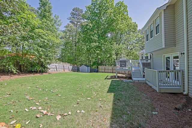 2775 Whippoorwill Cir, Duluth, GA 30097 - fenced backyard with a shed, a wooden deck, and stairway