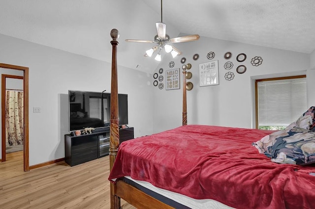 2775 Whippoorwill Cir, Duluth, GA 30097 - bedroom featuring lofted ceiling, light wood-type flooring, and a ceiling fan