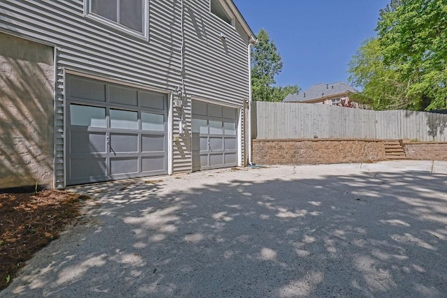 2775 Whippoorwill Cir, Duluth, GA 30097 - garage featuring driveway