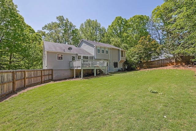 2775 Whippoorwill Cir, Duluth, GA 30097 - rear view of house with a wooden deck, a fenced backyard, and stairs