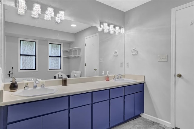 2775 Whippoorwill Cir, Duluth, GA 30097 - bathroom with double vanity and toilet