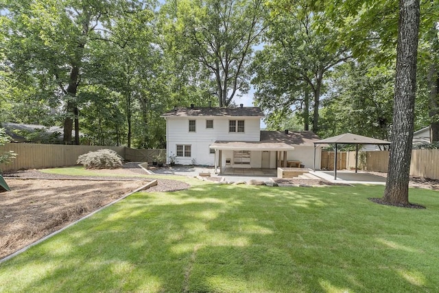 3981 Longview Dr, Chamblee, GA 30341 - rear view of property with a fenced backyard and a patio area