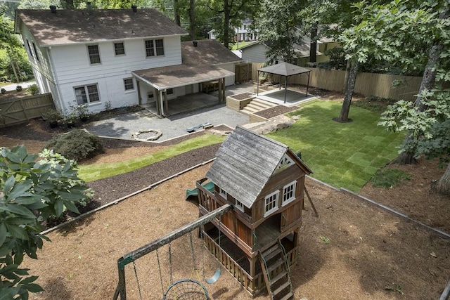 3981 Longview Dr, Chamblee, GA 30341 - rear view of house with a gazebo, a fenced backyard, and a shingled roof