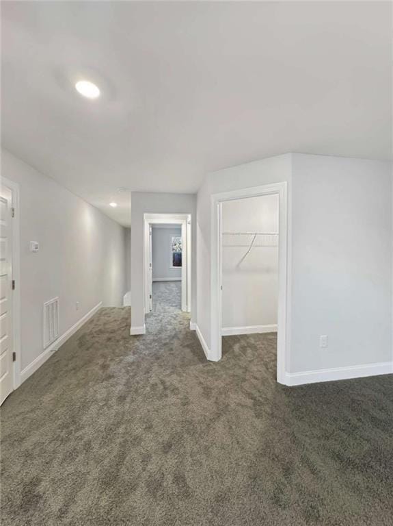 interior space with recessed lighting, visible vents, and baseboards