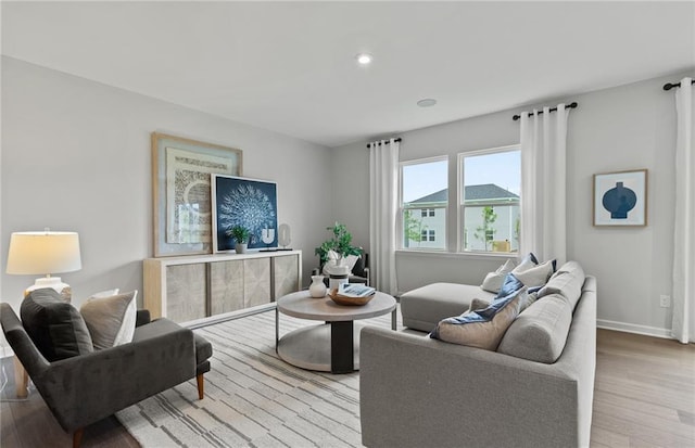 3071 Birdsong Ave, Covington, GA 30016 - living room featuring baseboards, wood finished floors, and recessed lighting