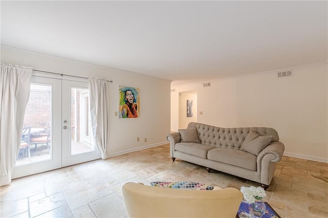 4101 Dunwoody Club Dr Unit 49, Atlanta, GA 30350 - living area featuring stone tile floors, baseboards, visible vents, and ornamental molding