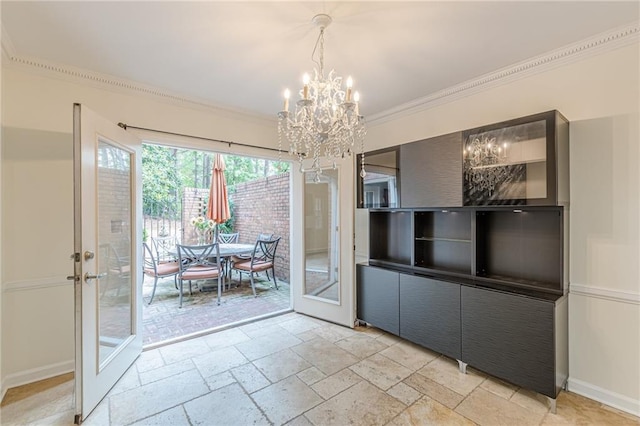 4101 Dunwoody Club Dr Unit 49, Atlanta, GA 30350 - dining room featuring crown molding, baseboards, a notable chandelier, and stone tile flooring