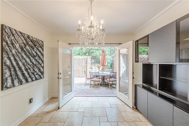 4101 Dunwoody Club Dr Unit 49, Atlanta, GA 30350 - doorway to outside with ornamental molding, a chandelier, and stone tile floors