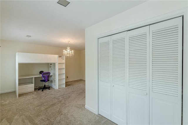 4101 Dunwoody Club Dr Unit 49, Atlanta, GA 30350 - interior space featuring baseboards, carpet, a closet, and a notable chandelier