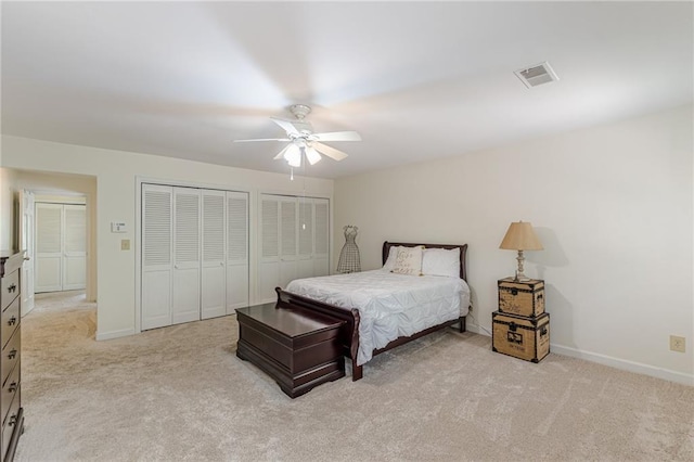 4101 Dunwoody Club Dr Unit 49, Atlanta, GA 30350 - bedroom with visible vents, carpet flooring, baseboards, and two closets
