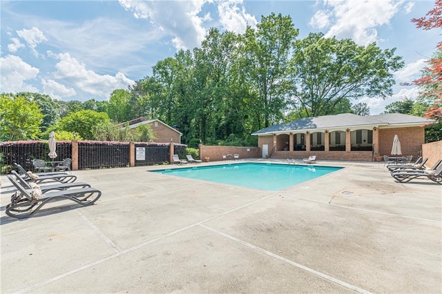 4101 Dunwoody Club Dr Unit 49, Atlanta, GA 30350 - pool featuring a patio and fence