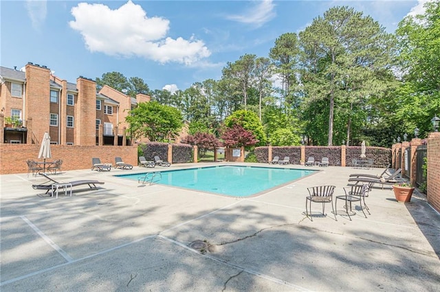 4101 Dunwoody Club Dr Unit 49, Atlanta, GA 30350 - pool with fence and a patio