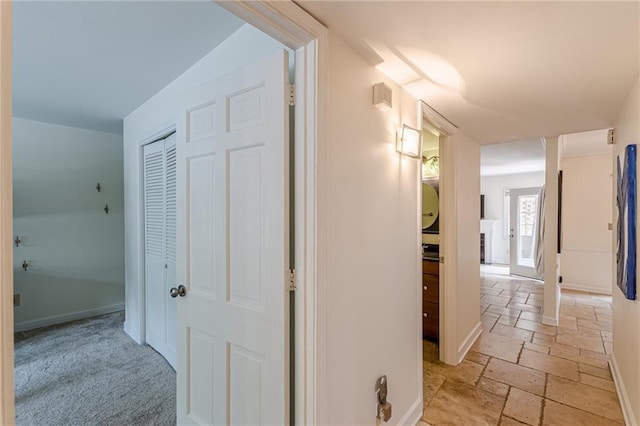 4101 Dunwoody Club Dr Unit 49, Atlanta, GA 30350 - hallway with baseboards, visible vents, and stone tile floors