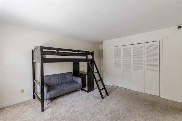 4101 Dunwoody Club Dr Unit 49, Atlanta, GA 30350 - unfurnished bedroom featuring baseboards, carpet flooring, and a closet