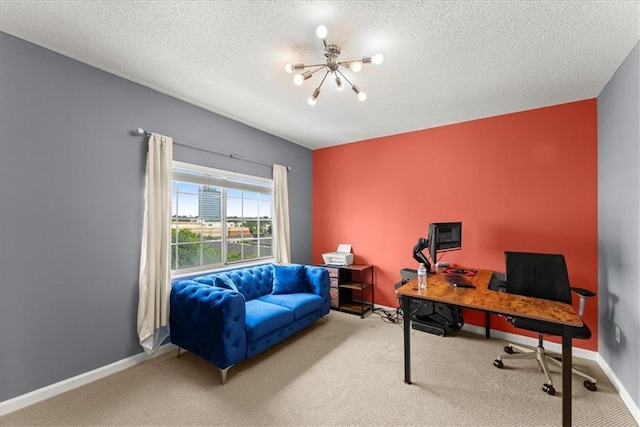 carpeted office with a chandelier and a textured ceiling