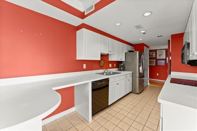 kitchen featuring sink, light tile patterned floors, white cabinets, and stainless steel appliances