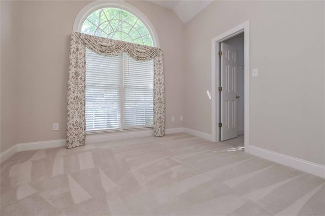 1239 Brentwood Ct, Douglasville, GA 30135 - carpeted spare room with lofted ceiling and baseboards