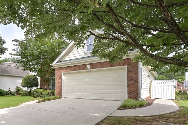 1239 Brentwood Ct, Douglasville, GA 30135 - garage featuring concrete driveway