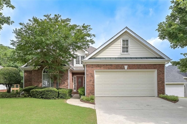 1239 Brentwood Ct, Douglasville, GA 30135 - view of front of home with brick siding, a front lawn, and driveway