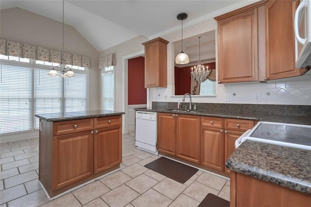 1239 Brentwood Ct, Douglasville, GA 30135 - kitchen featuring a chandelier, white appliances, plenty of natural light, vaulted ceiling, and light tile patterned floors