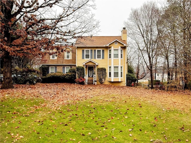 view of front of home with a front yard