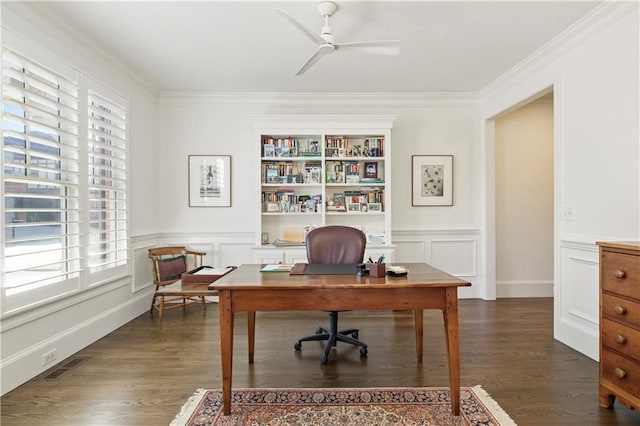 office with ceiling fan, ornamental molding, dark wood-style floors, and a decorative wall