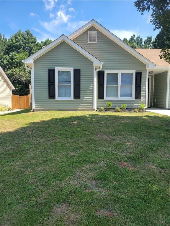 single story home with a carport and a front lawn