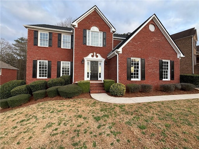 view of front of house featuring a front lawn