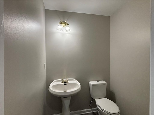 bathroom with tile patterned flooring, toilet, vanity, and a shower with shower door