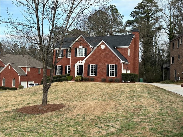 view of front of house featuring central AC and a front lawn