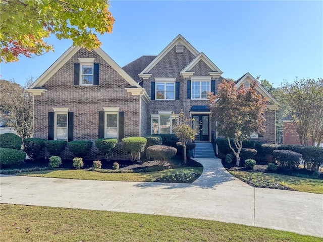 view of front of home featuring a front yard