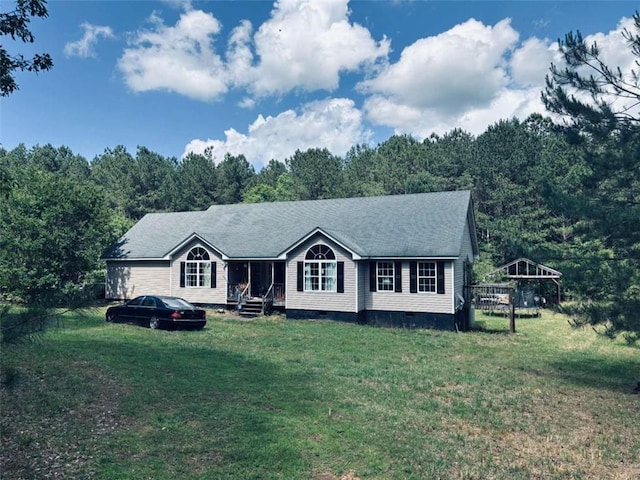 1383 Sims Rd, Winder, GA 30680 - view of front of home featuring crawl space, a front lawn, and a wooded view