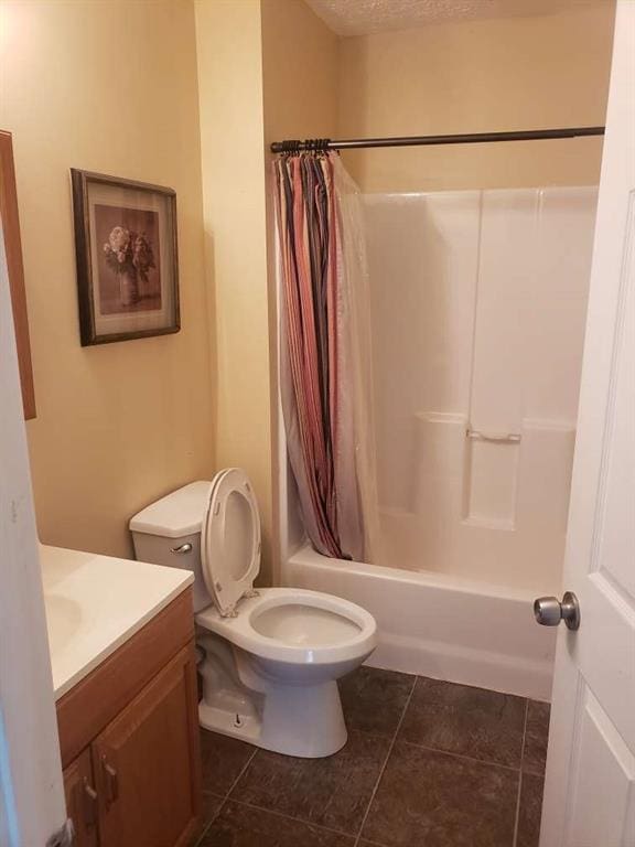 1383 Sims Rd, Winder, GA 30680 - bathroom featuring vanity, toilet, tile patterned floors, and shower / tub combo with curtain