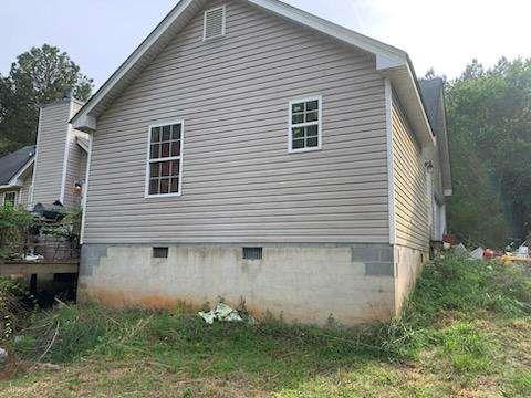 1383 Sims Rd, Winder, GA 30680 - view of side of property with crawl space