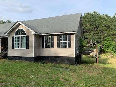 1383 Sims Rd, Winder, GA 30680 - view of property exterior with crawl space and a lawn