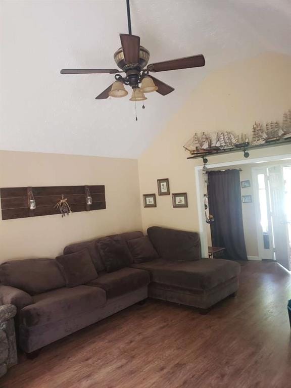 1383 Sims Rd, Winder, GA 30680 - living area featuring wood finished floors, vaulted ceiling, and ceiling fan
