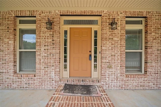 doorway to property featuring a porch