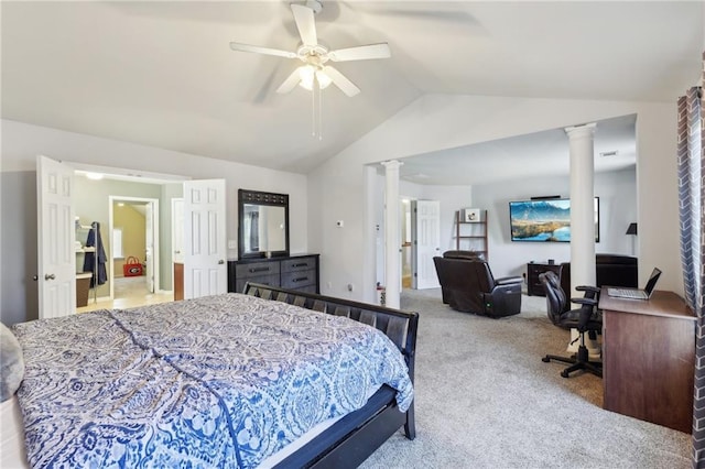 carpeted bedroom featuring vaulted ceiling, ceiling fan, and decorative columns