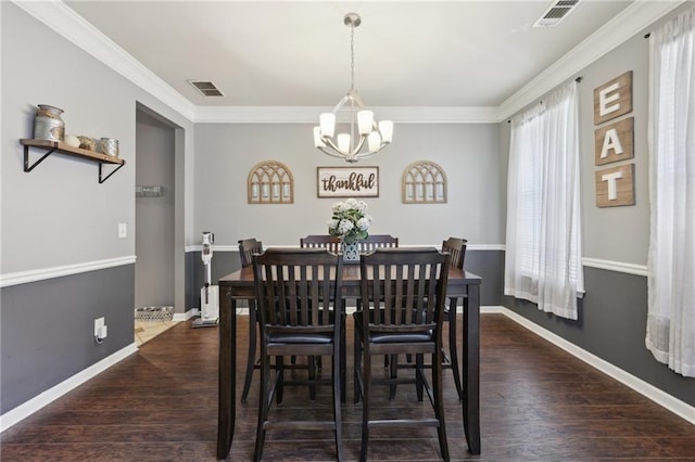 dining room featuring baseboards, visible vents, and dark wood-type flooring