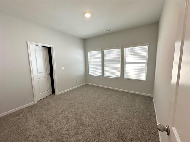 bathroom with hardwood / wood-style floors, an enclosed shower, and vanity