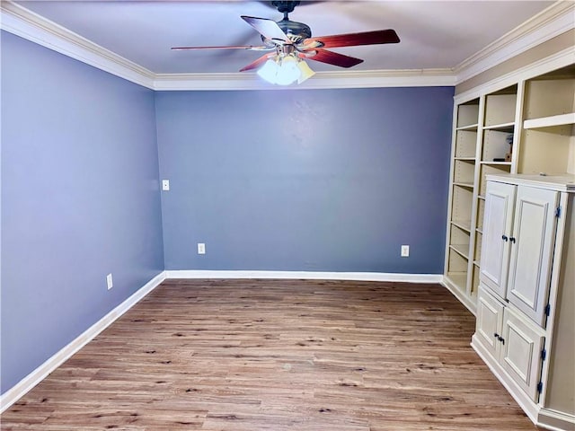 empty room featuring ceiling fan, light hardwood / wood-style flooring, built in features, and ornamental molding