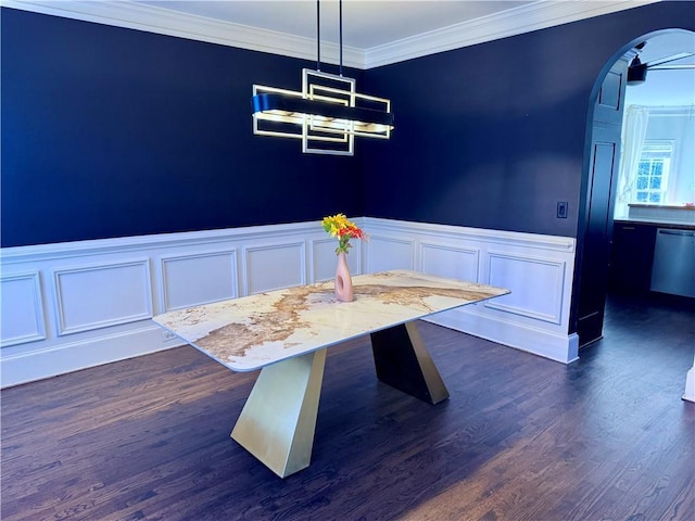 unfurnished dining area featuring dark wood-type flooring and crown molding