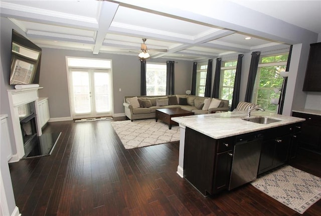 116 Festoon Ct, Smyrna, GA 30080 - kitchen with stainless steel dishwasher, a sink, coffered ceiling, a fireplace, and beam ceiling